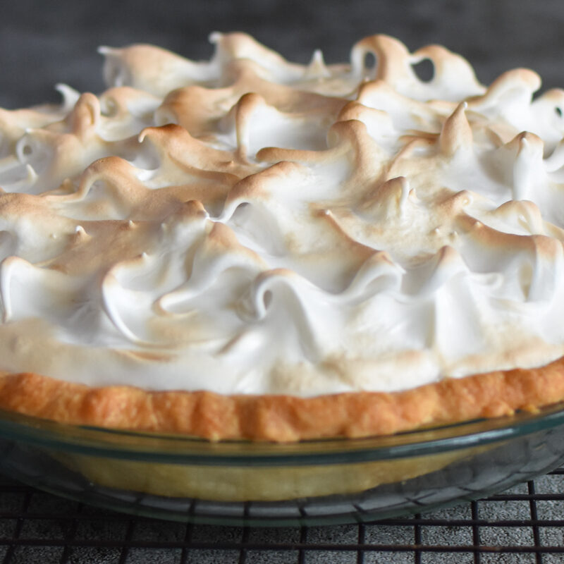 Butterscotch Meringue Pie on a cooling rack.