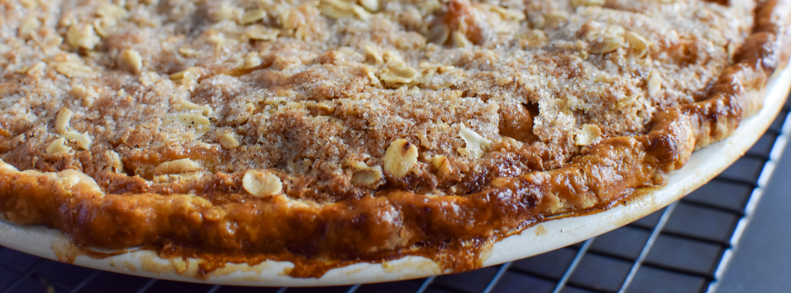 Apple Cream Pie on a cooling rack.