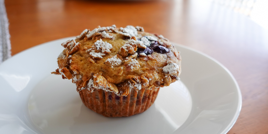 This recipe for cherry muffins creates perfectly shaped treats that look excellent on white plates.