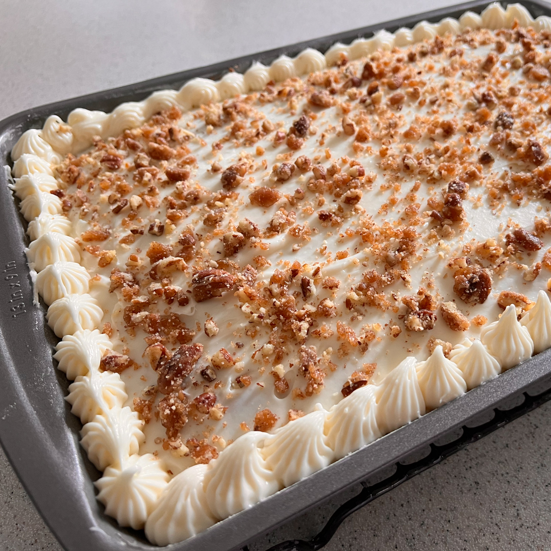 This is an image of a carrot cake in a 13"x9" cake pan.