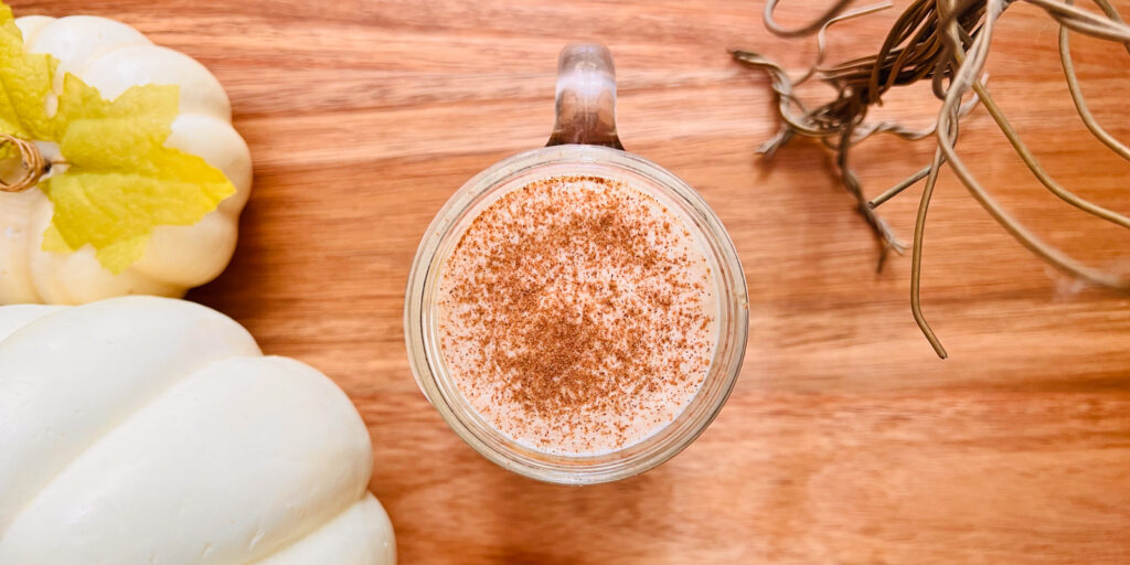 This is a top-down view of pumpkin cold foam on top of cold brew coffee.