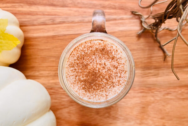 This is a top-down view of pumpkin cold foam on top of cold brew coffee.