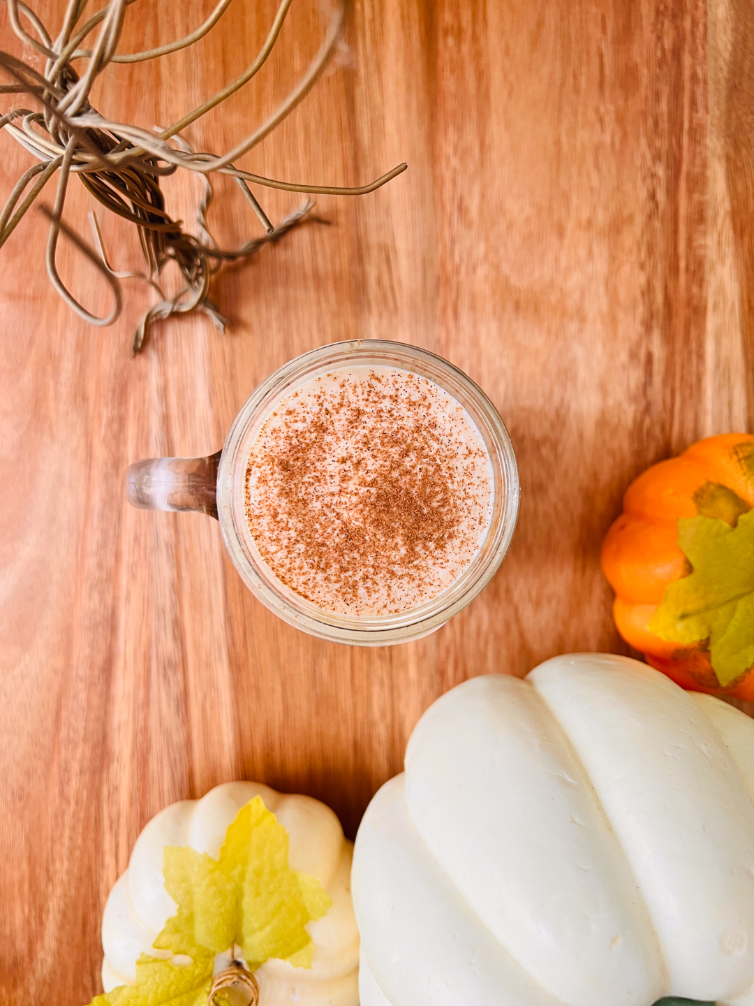 This is a top down view of a pumpkin cream cold brew beverage.