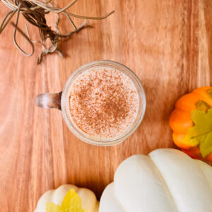 This is a top-down view of pumpkin cold foam on top of cold brew coffee.