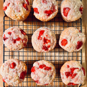 Strawberry Muffins on a cooling rack.