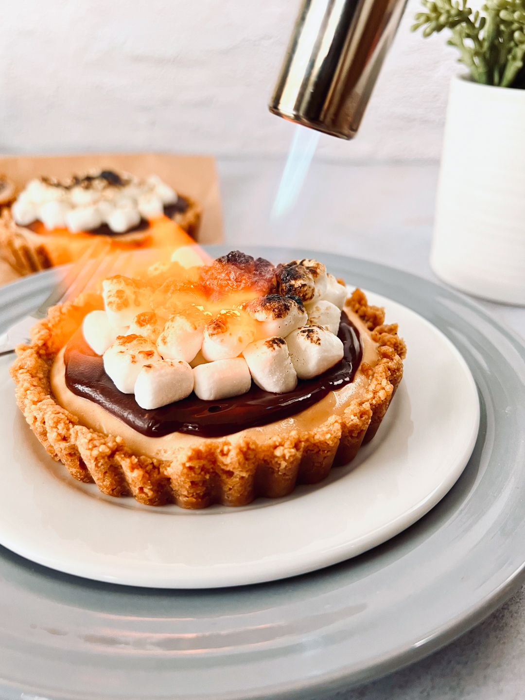 This is an image of the tart with marshmallows being torched on top.