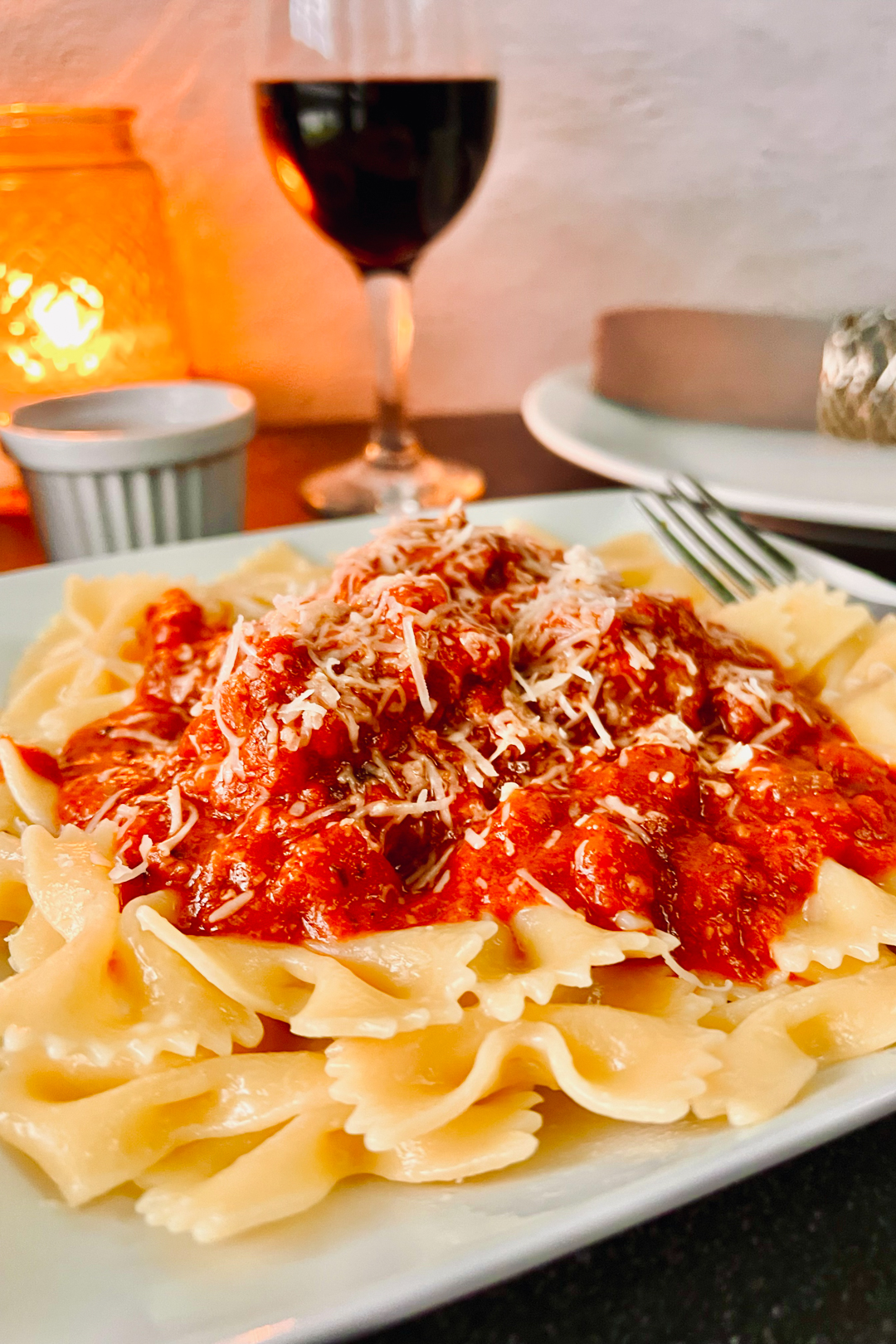 Italian Meatballs and Sauce over a bed of pasta.