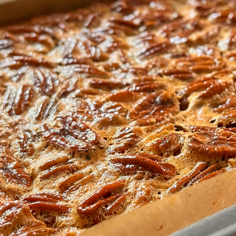 Closeup of Pecan Pie Bars still in the pan.